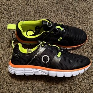 Black and Orange Athletic Shoes with Modern Design
